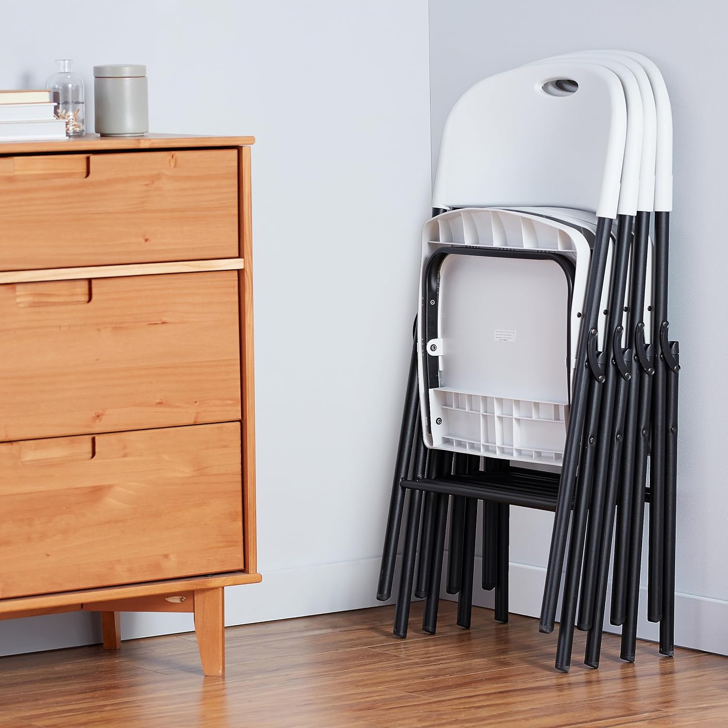 Amazon Basics Foldable Portable Comfortable Sturdy Folding Plastic Chair, 350-Pound Capacity, White, 4-Pack